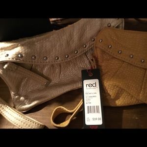 Mark echo wrist handbags  with original tags